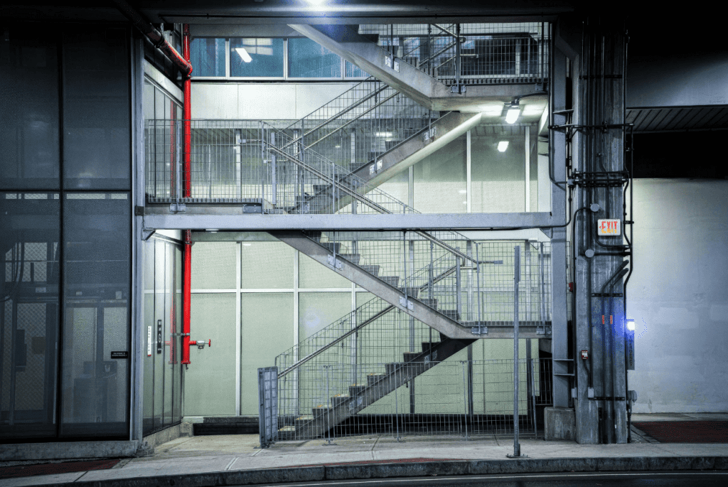 emergency exit stairwell with proper emergency lighting for safe evacuation.